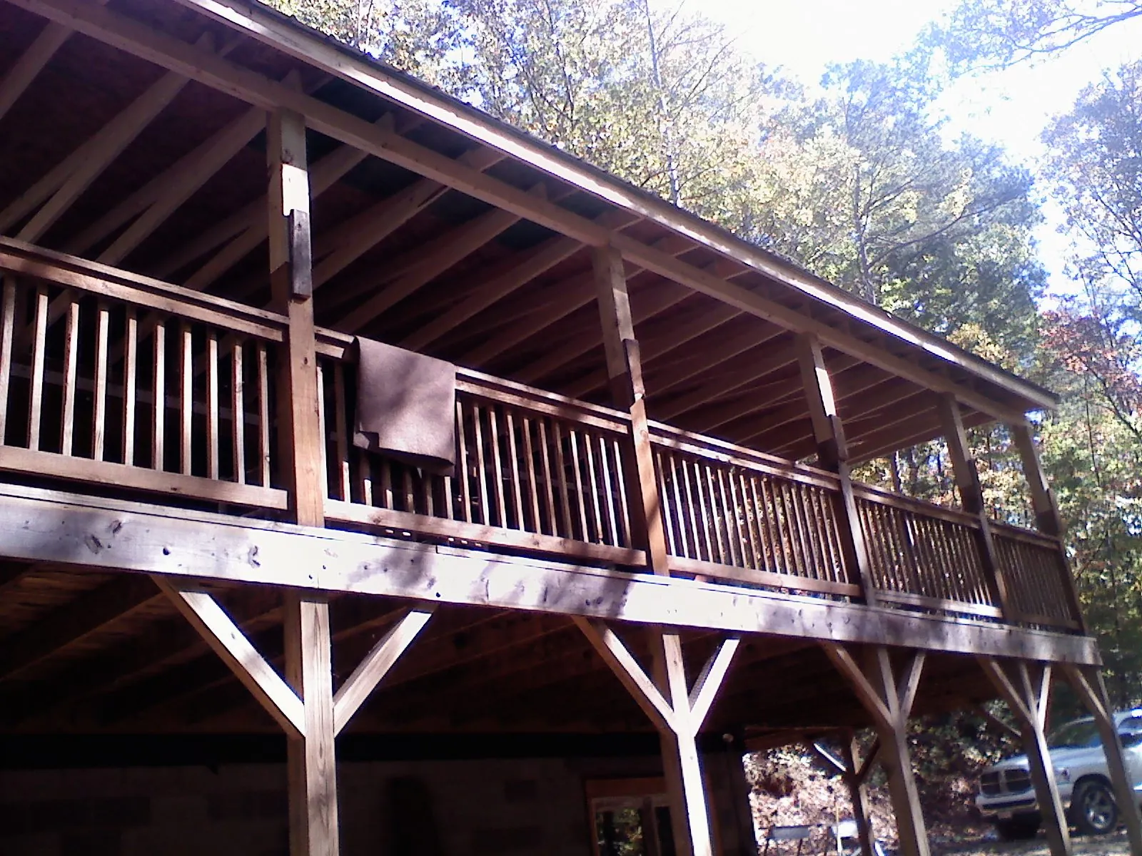 Timber framing under a new elevated porch and deck — Roof Leak Repair in Highwood by Roofing Brothers